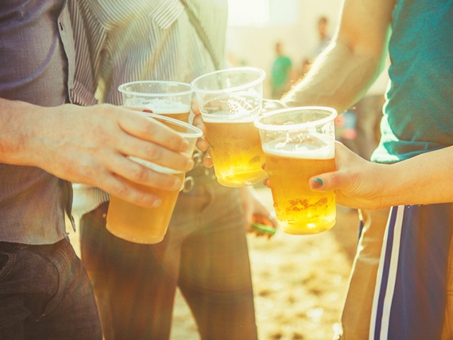 friends toasting with beer