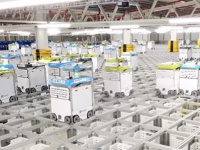 出荷じゃ出荷じゃ～！数千機のロボットがマス目に分類された商品の上を縦横無尽に走り回る倉庫内の光景（イギリス）