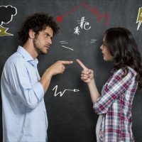 Discussion Between Guy And Girl Over Gray Background