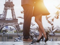 couple near Eiffel tower in Paris, romantic kiss