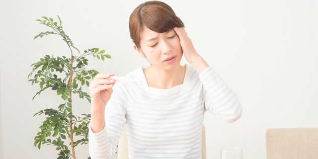 発熱した女性