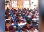 ちょっとやりすぎ！？　勉強中の子供の姿勢を正すための器具を設置する小学校。