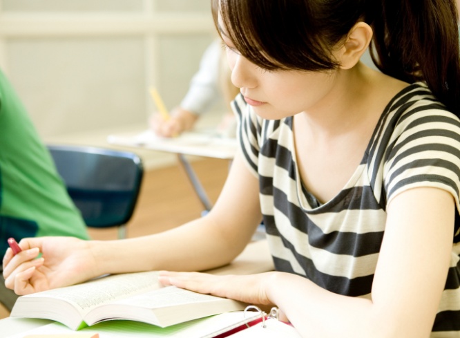 Female student studying in classroom