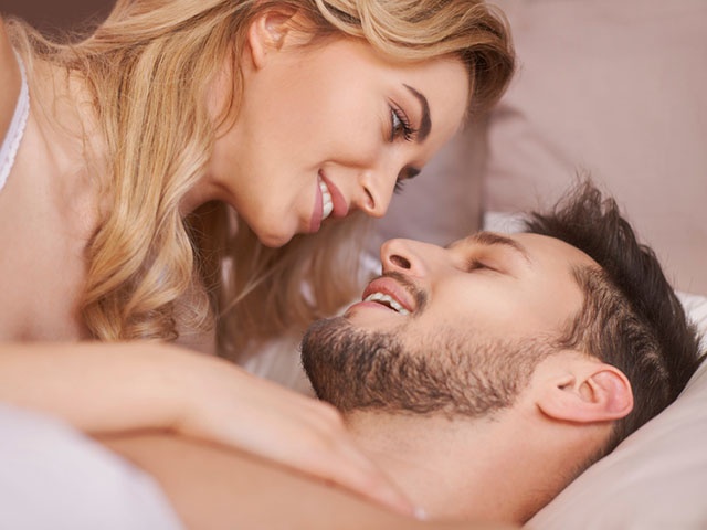Close up of charming young couple during the foreplay