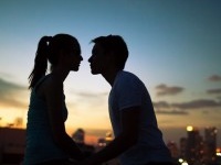 Romantic couple kissing in the city